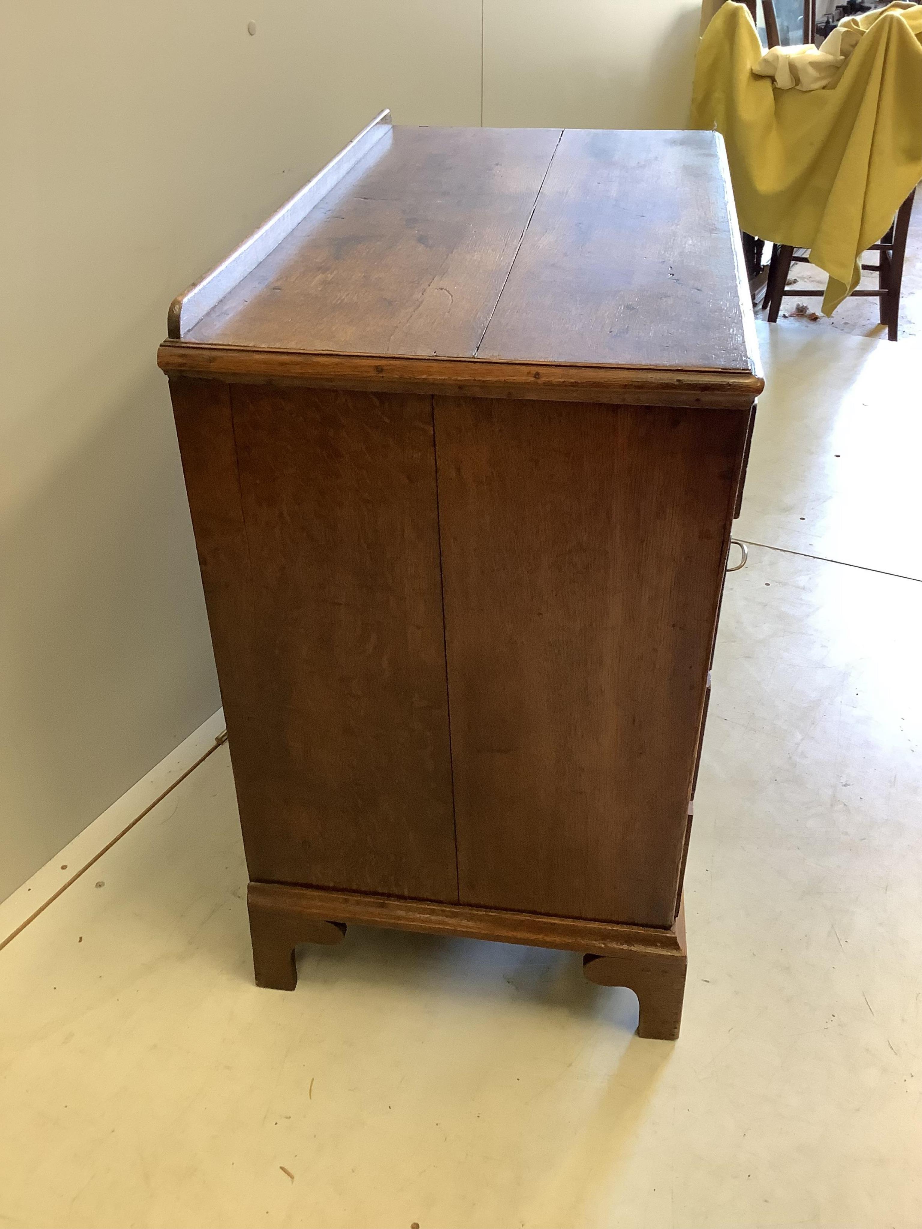 A George lll Provincial oak kneehole desk, width 86cm, depth 46cm, height 78cm. Condition - fair